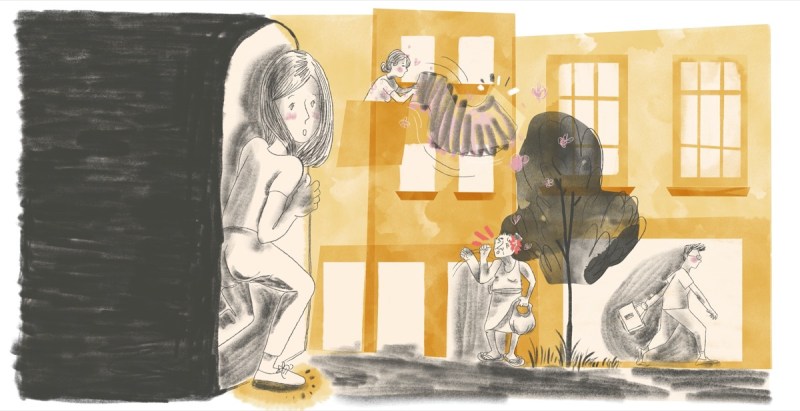 A bespectacled man is walking determinedly on the street, briefcase in hand.